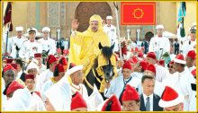 a man in a yellow robe is riding a black horse