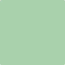 a close up of a light green background with a white border .