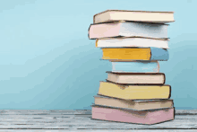 a stack of books on a blue background