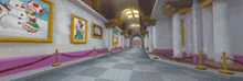 a long hallway with paintings on the walls and a checkered floor