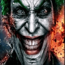 a close up of a joker 's face with his mouth open