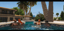 a group of people are sitting in a swimming pool with palm trees in the background