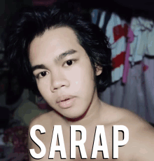 a shirtless young man with the word sarap written above him