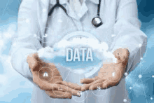 a doctor is holding a cloud with the word data written on it .