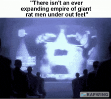 a group of people are looking at a giant rat men under out feet