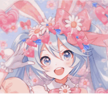 a girl wearing a bunny ears headband with hearts on it