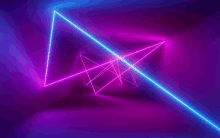 a neon tunnel with triangles and lines glowing in the dark