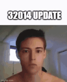 a shirtless man is looking at the camera with the words `` 32014 update '' written on the bottom of his face .