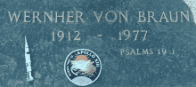 a memorial for wernher von braun with a rocket and patch