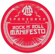 a red sign that says rock n roll manifesto