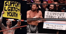 a man in a wrestling ring holding a sign that says support lgbtq youth .