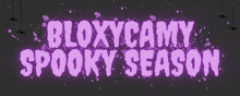 purple text that says bloxycamy spooky season on a purple background