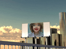 a billboard with a little girl on it