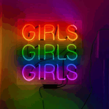 a neon sign that says girls girls girls on it