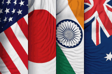 the flags of the united states of america japan india and australia are displayed together