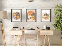 three framed pictures hang on a white brick wall