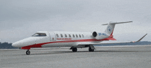 a polish air ambulance plane is parked on the tarmac