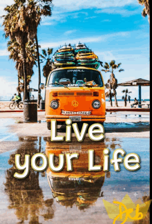 an orange van with surfboards on top of it and the words live your life