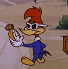 woody woodpecker is wearing sunglasses and holding a clock in his hand .