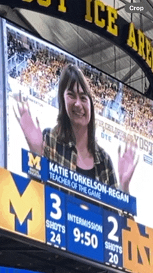 katie torkelson-regan is shown on a scoreboard