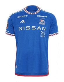 a blue shirt with nissan 90 on it