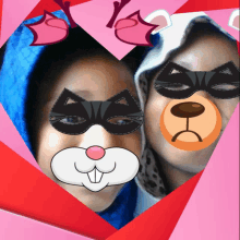 two girls wearing masks in a heart shape