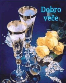 a greeting card with two wine glasses and yellow roses says dobro vece