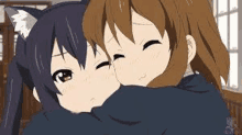 a couple of anime girls hugging each other .