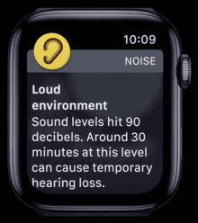 a smart watch displays a message about loud environment sound levels