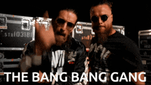 two men standing next to each other with the words the bang bang gang on the bottom right