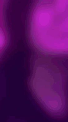 a purple background with a blurred texture and a purple glow