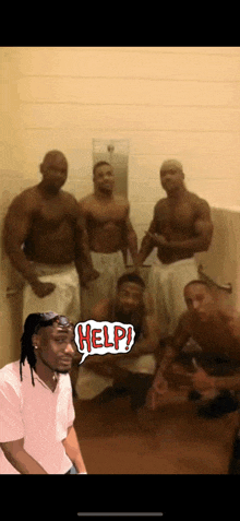 a group of men are posing for a picture in a bathroom with help written on the bottom right