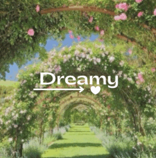 a picture of a garden with flowers and the word dreamy