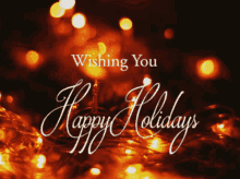 a greeting card wishing you happy holidays with christmas lights in the background