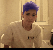 a young boy with purple hair is wearing a white shirt with the canadian flag on the back