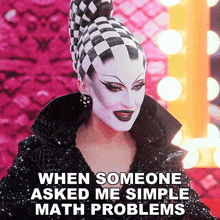 a woman in a black and white checkered hat with the words when someone asked me simple math problems