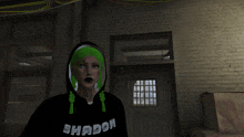 a woman with green hair wearing a shadow hoodie