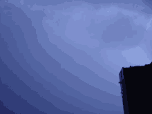 a lightning bolt is visible in a dark blue sky