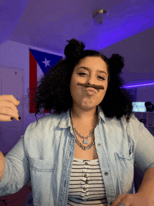 a woman making a fake mustache with a stick