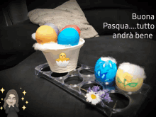 a picture of easter eggs with the words buon pasqua tutto andra bene written on the bottom