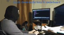 a man in a mask is typing on a keyboard with the words " stucki checking for bots in leaderboard " written above