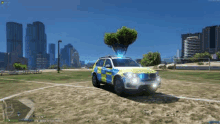 a police car is parked in a field in a video game with a tree in the back .