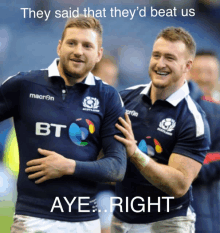 two scotland rugby players are hugging each other with a caption that says aye right