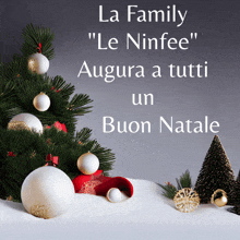 a picture of a christmas tree with the words la family " le ninfee augura a tutti un buon natale " below it