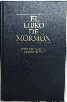 a black leather bound book with the title el libro de mormon