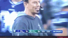 a cbs sports screen shows a football game between the dallas cowboys and the new york jets