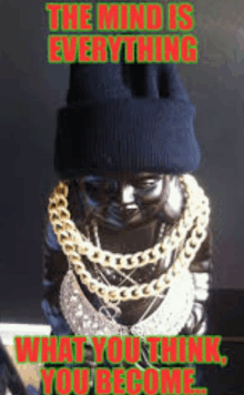 a buddha wearing a beanie and chains says the mind is everything