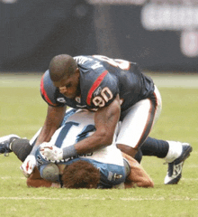 a football player with the number 90 on his back