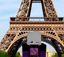 a picture of the eiffel tower with a cartoon girl in front of it