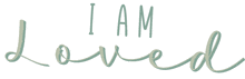 the word i am loved is written in green cursive on a white background .